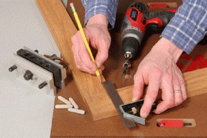 How to Make a Dowel Joint -  Draw lines, Mark the holes ¼ inches away from the dowel edges