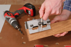 How to Make a Dowel Joint - Clamp the doweling jig
