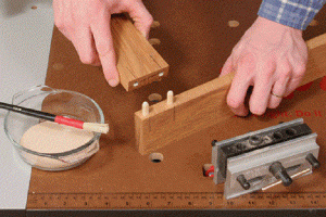 How to Make a Dowel Joint - Slip the dowels into the holes