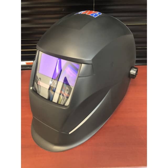 Variable-shade lens welding helmet
