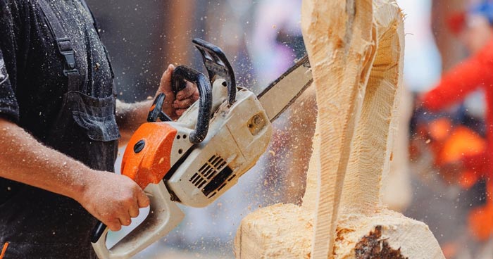 How do you price a chainsaw carving